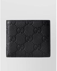 Gucci - Imprint Textured Leather Bi-Fold Wallet - Lyst