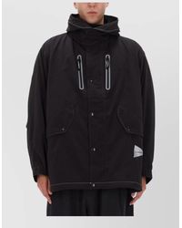 and wander - Fishtail Octa Hooded Long Jacket - Lyst