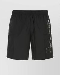 McQueen - Logo-Print Swim Shorts - Lyst