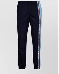 Lacoste - Trousers With Elastic Cuffs And Side Stripe - Lyst
