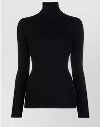 Wolford - Virgin Wool Ribbed Slim-Fit Turtleneck Long-Sleeve Top - Lyst