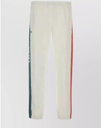 Lacoste - Joggers With Printed Logo And Side Stripes - Lyst