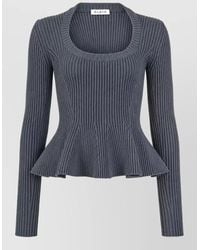 Alaïa - Ribbed Peplum Long-Sleeve Top - Lyst