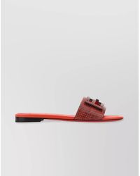 Fendi - Leather Flat Sole Slides With Metal Embellishment - Lyst