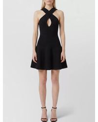 Alaïa - Knit Mini Dress Cross Neckline Cutout - Lyst