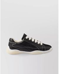 Prada - Leather Low-Top Sneakers - Lyst