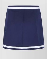 Sporty & Rich - Mila Serif Logo Pleated Mini Shorts - Lyst