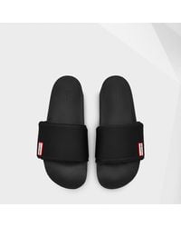 HUNTER Sandals, slides and flip flops 