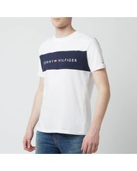 Tommy Hilfiger – es Lounge-T-Shirt mit Rundhalsausschnitt und kontrastierendem Logo-Einsatz auf der Vorderseite - Weiß