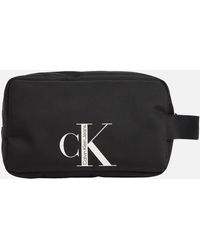Calvin Klein Sport Essentials Logo-printed Canvas Washbag - Black