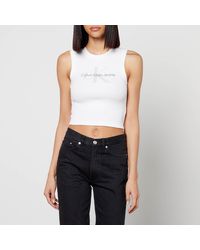 Calvin Klein - Archival Monologo Ribbed-Cotton Jersey Tank Dress - Lyst