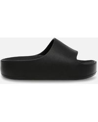 Fuzzy steve madden slides 2025