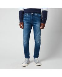 Tommy Hilfiger Tapered jeans for Men - Up to 64% off at Lyst.com