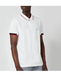 Tommy Hilfiger Polo shirts for Men - Up to 51% off at Lyst.co.uk