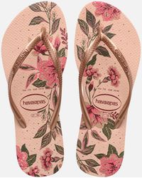 shoes Womens Shoes Flats and flat shoes Sandals and flip-flops Havaianas Synthetic Top Marvel Logomania Flip Flops / Sandals in Black 