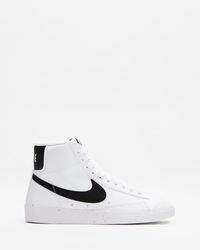 navy high top trainers womens