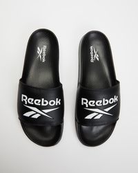 Reebok Flat sandals for Women - Up to 