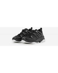 black leather running trainers