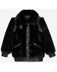 The Kooples Schwarzer Kunstpelzmantel mit Lederdetail