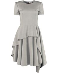 Womens Clothing Dresses Mini and short dresses Save 35% Alexander McQueen Wool Buttoned-shoulder Mini Dress in White 