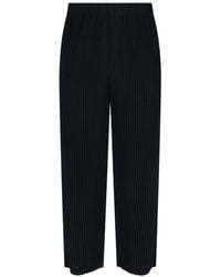 Homme Plissé Issey Miyake - Trousers - Lyst