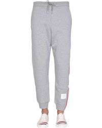 Thom Browne - Pantalone Jogging Con Rwb Stripe - Lyst