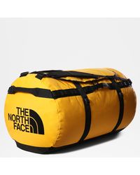 The North Face Un sac duffel tout-en-un - Jaune
