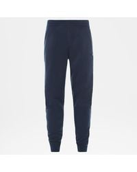 blue north face tracksuit bottoms