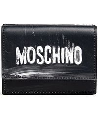Moschino Andere materialien brieftaschen in Blau Damen Accessoires Portemonnaies und Kartenetuis 