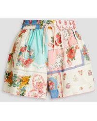 Zimmermann - Geraffte shorts aus baumwolle mit floralem print - Lyst