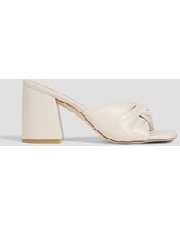 Stuart Weitzman - Mules "glamknot 85" aus leder - Lyst