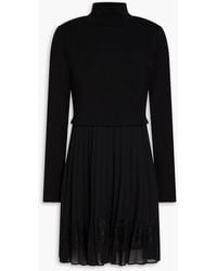 Claudie Pierlot - Plissiertes minikleid aus jersey mit spitzenbesatz und crêpe-einsätzen - Lyst