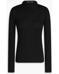 FRAME - Ribbed Jersey Turtleneck Top - Lyst