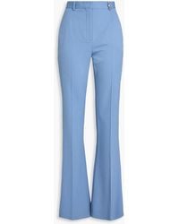 Versace - Wool-Blend Twill Flared Pants - Lyst