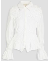 Khaite - Hallow Cotton-poplin Peplum Shirt - Lyst