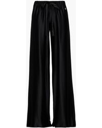 Mujer Ropa de Pantalones Pantalones rectos Tiger Tooth de Roberto Cavalli de color Negro pantalones de vestir y chinos de Pantalones de pernera recta 