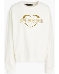 Dames Kleding voor voor Kleding voor sport en joggingpakken gym en workout voor Trainings Love Moschino Katoen T-shirt Met Logopatch in het Wit 