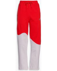 Ganni - Logo-embroide Two-tone Organic French Cotton-terry Track Pants - Lyst
