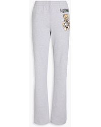 Moschino - Printed French Cotton-terry Track Pants - Lyst
