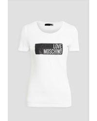 Love Moschino Cotton Round Neck Short Sleeve Slip On Printed T-shirt in White Save 34% Womens Clothing Tops T-shirts 