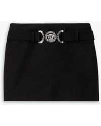 Versace - Minirock aus grain de poudre aus wolle mit gürtel - Lyst