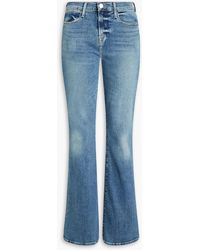 Damen Bekleidung Jeans Schlagjeans FRAME Baumwolle High-Rise Flared Jeans in Schwarz 
