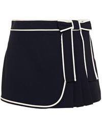 RED Valentino - Bow-embellished Pleated Crepe Shorts - Lyst