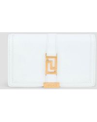 Versace - Portemonnaie aus leder - Lyst