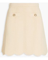 Sandro - Button-detailed Ribbed-knit Mini Skirt - Lyst