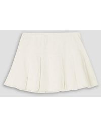 Sea - Jamie Frayed Pleated Denim Mini Skirt - Lyst