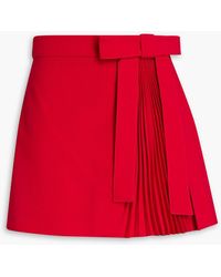 RED Valentino - Skirt-effect Bow-embellished Pleated Crepe Shorts - Lyst