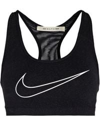 Nike Sport-bh aus jersey und mesh mit glitter-finish und print - Schwarz