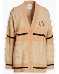 Sandro - Pompom-trimmed Cable-knit Wool Cardigan - Lyst