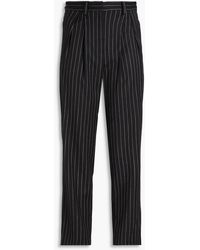 IRO - Pleated Pinstriped Wool-blend Tapered Pants - Lyst